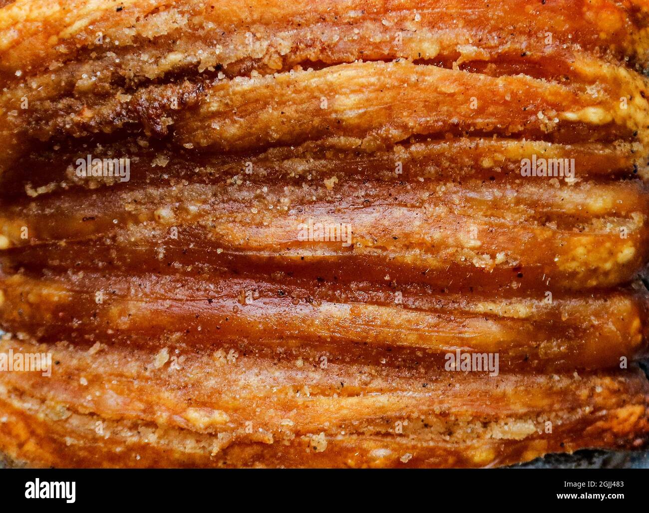 Crispy oven roasted pork rind closeup view Stock Photo Alamy