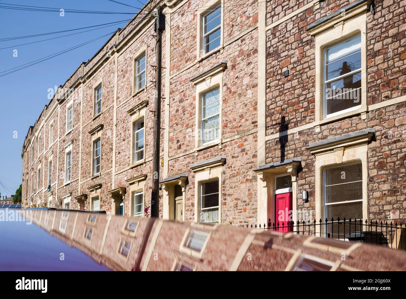Typical small Victorian terraced houses in Cliftonwood, Bristol, with reflection Stock Photo Alamy