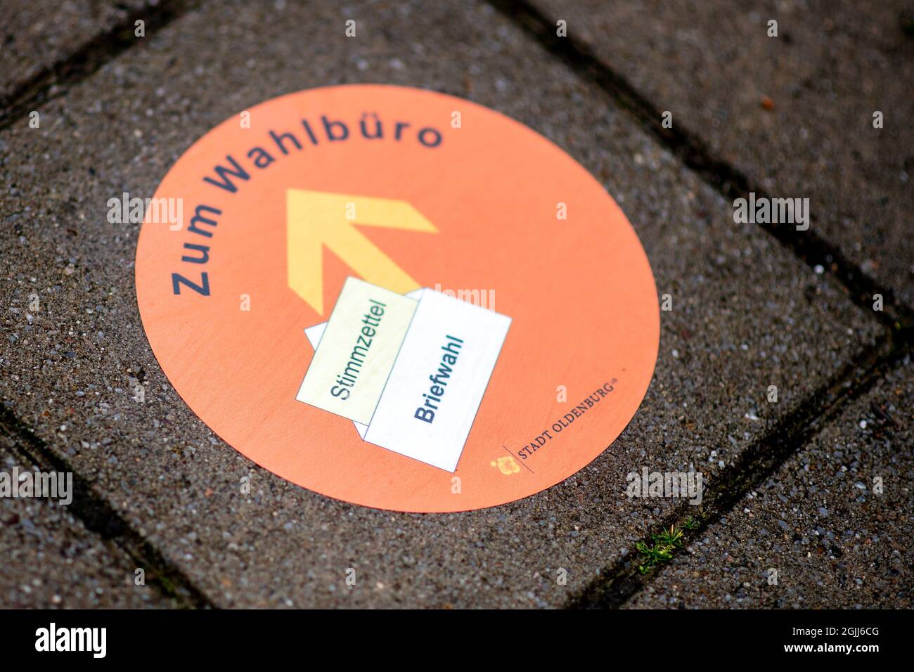 Oldenburg, Germany. 10th Sep, 2021. A sticker on the ground that reads