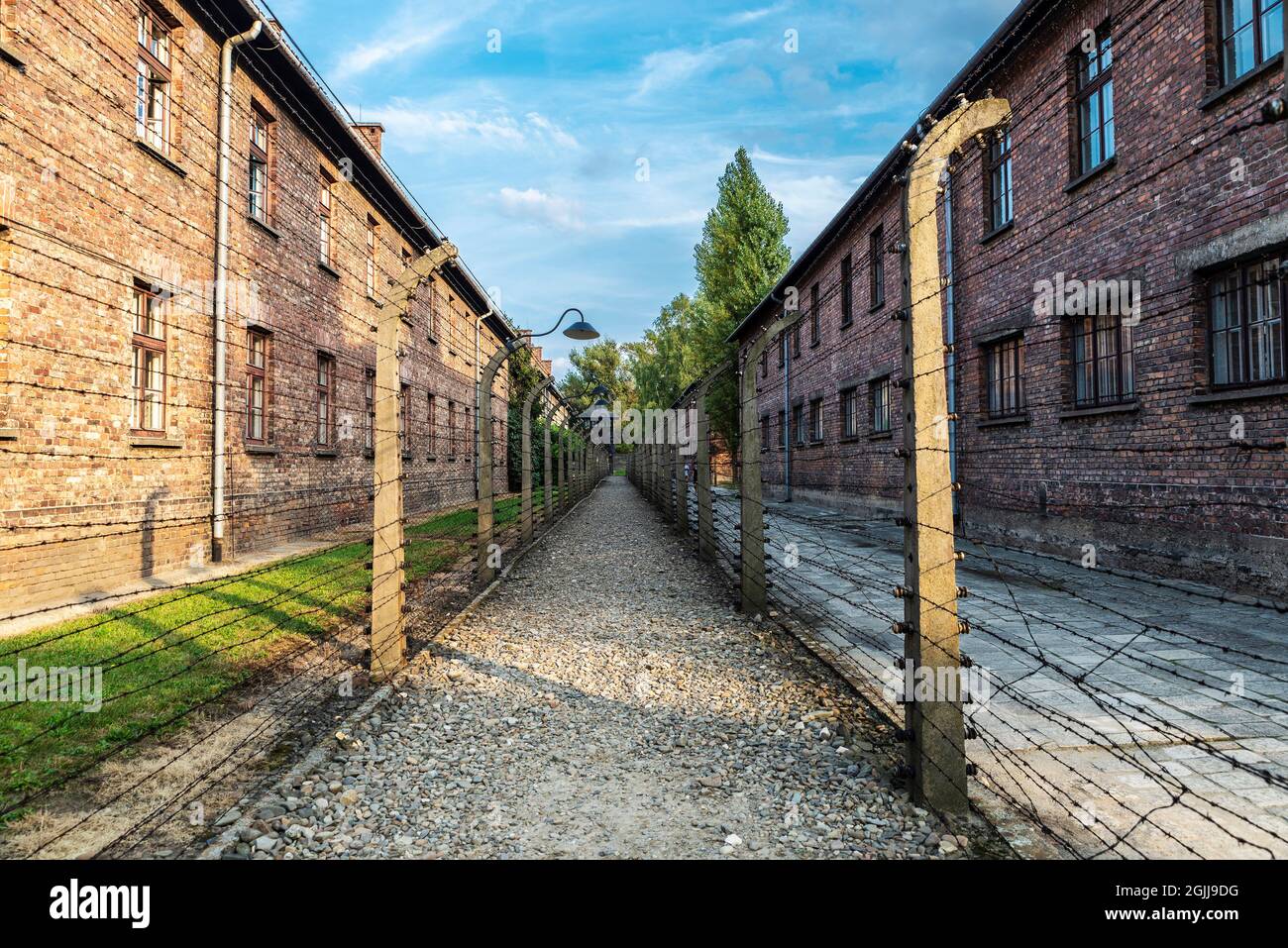 Auschwitz, Poland - August 30, 2018: Electrified fence of the Auschwitz concentration camp, an extermination camp operated by Nazi Germany during Worl Stock Photo