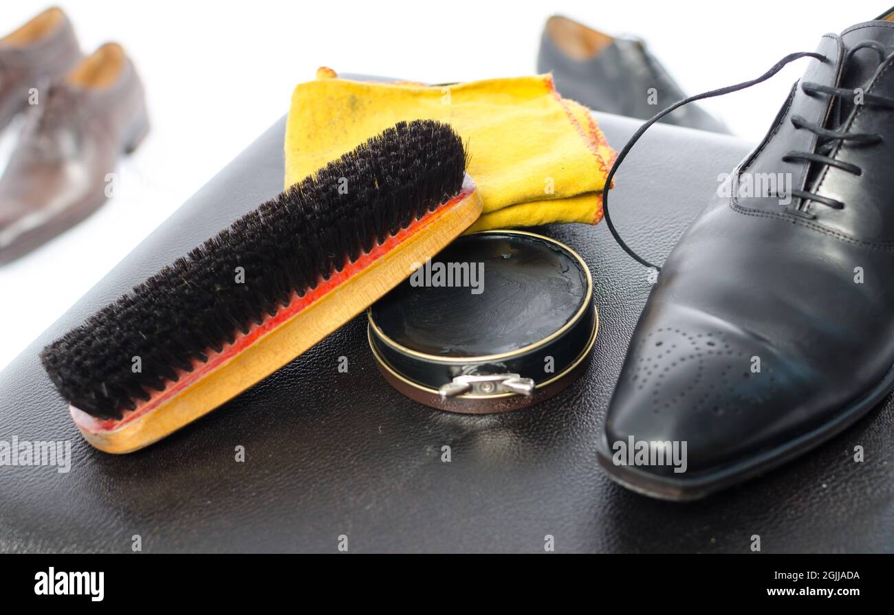 Shoe polish,brush, rag and black shoe Stock Photo Alamy