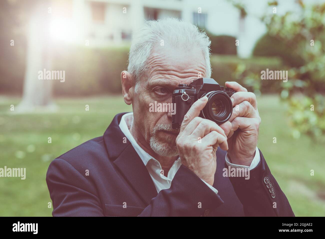 Mature man taking pictures hi-res stock photography and images - Alamy