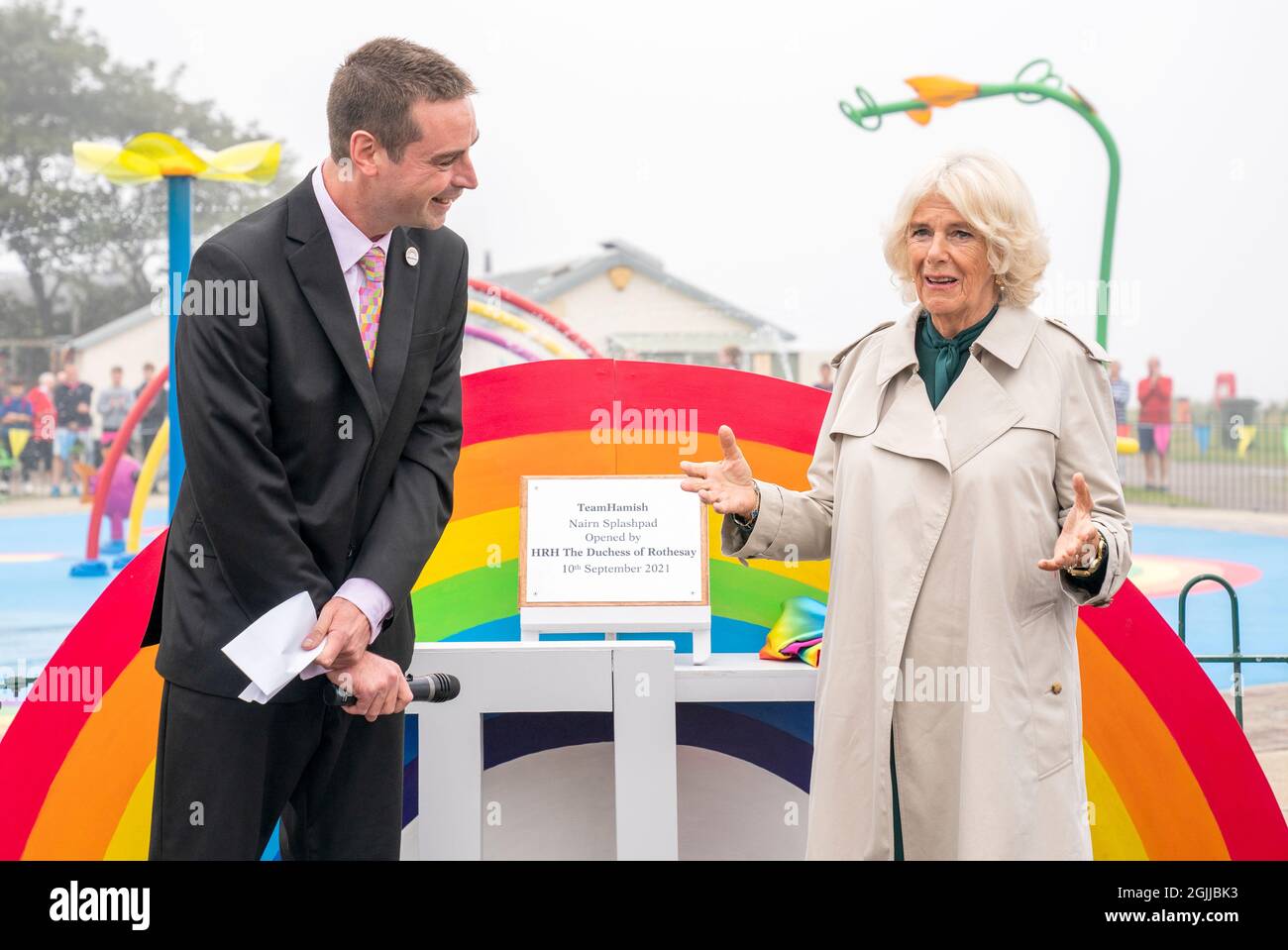 The Duchess of Cornwall, known as the Duchess of Rothesay when in Scotland, with Sam Heys (left) at the opening of the Team Hamish Splashpad in Nairn. Picture date: Friday September 10, 2021. Stock Photo
