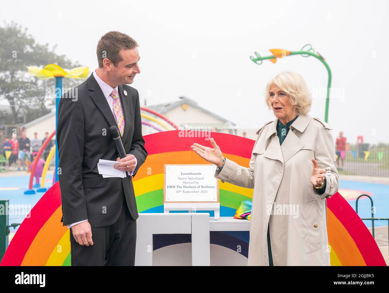 The Duchess of Cornwall, known as the Duchess of Rothesay when in Scotland, with Sam Heys (left) at the opening of the Team Hamish Splashpad in Nairn. Picture date: Friday September 10, 2021. Stock Photo