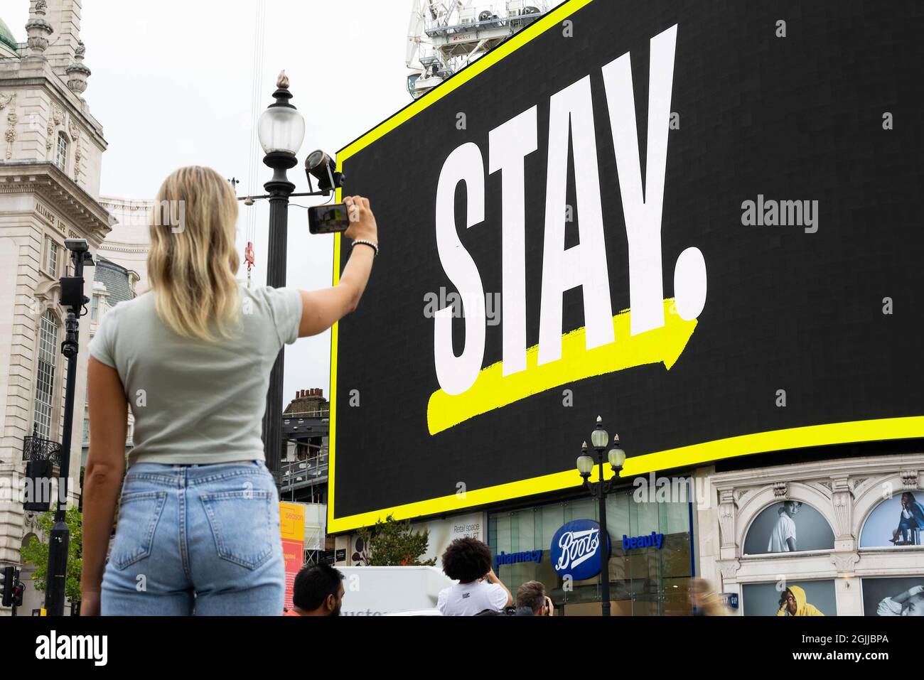 EDITORIAL USE ONLY The word 'STAY' features on the Piccadilly Circus Lights as part of a new campaign to mark World Suicide Prevention Day on Friday, September 10, by Campaign Against Living Miserably (CALM), London. Picture date: Friday, September 10, 2021. Stock Photo