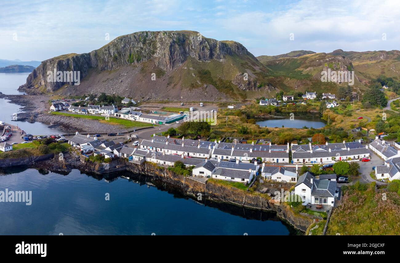 Aerial view from drone of former slate quarry and village of  Ellenabeich at Easdale on Seil Island, one of the slate islands, Argyll and Bute, Scotla Stock Photo