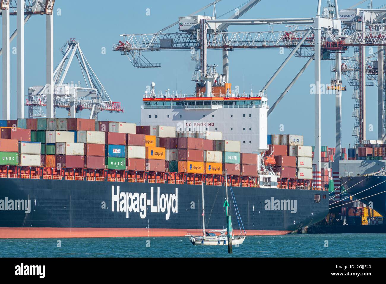 Port of Southampton (Southampton docks) in Hampshire, England, UK. View of a Hapag-Lloyd container ship in the container terminal. Stock Photo