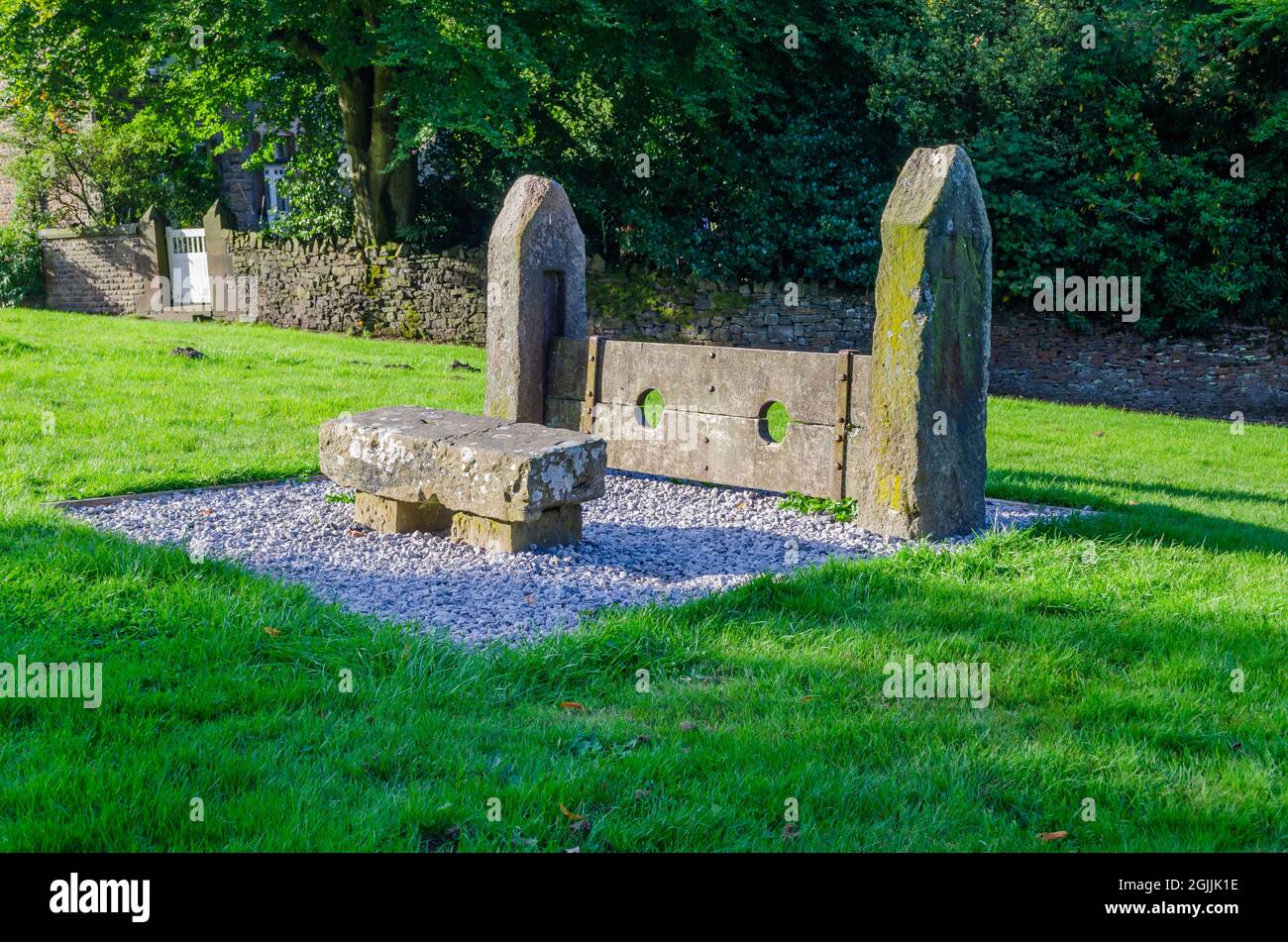 The old stocks at Rivington  village in Lancashire, an antique device for restraining and punishing an individual Stock Photo