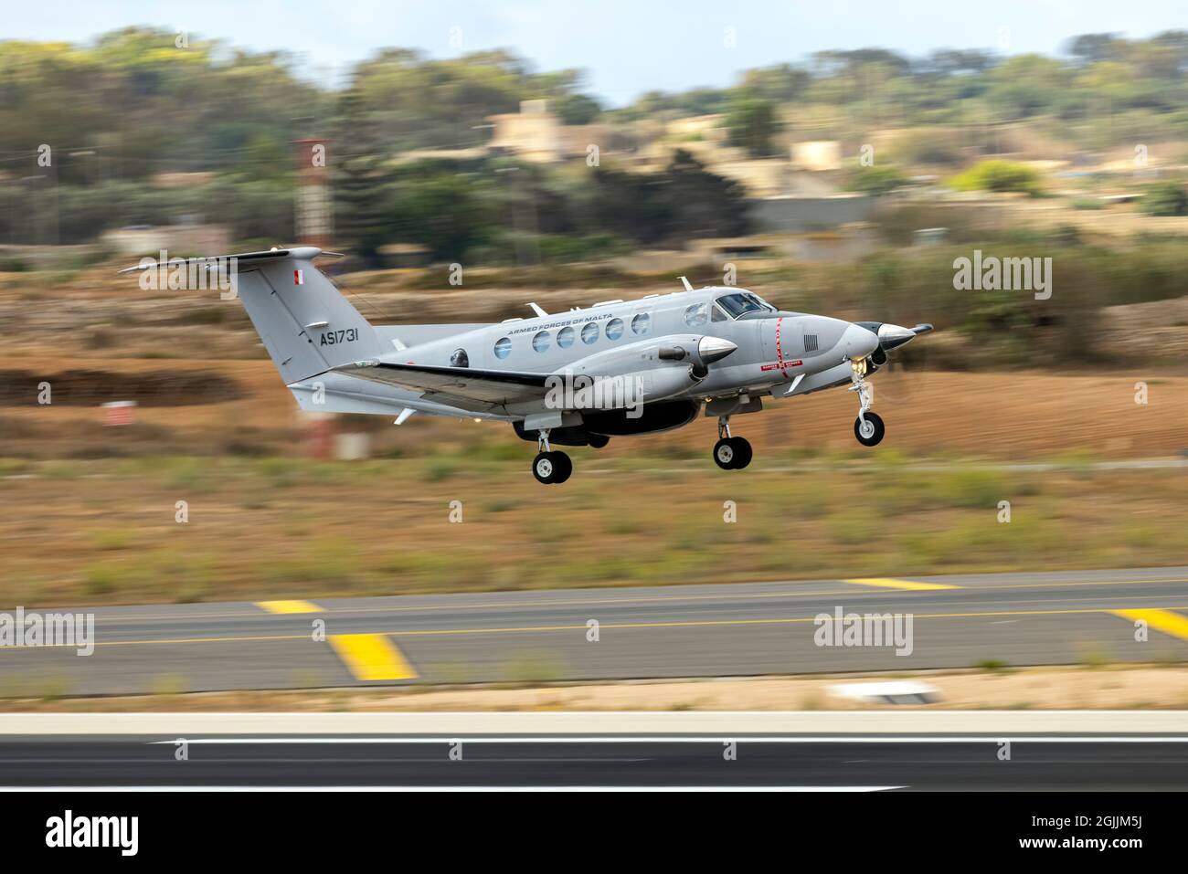 Maltese Air Force Hawker Beechcraft B200GT King Air (REG: AS1731) taking of for a search and rescue mission. Stock Photo