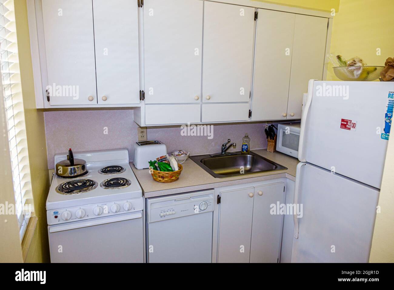 Delray Beach Florida,Wright by the Sea,hotel motel guest room,kitchen kitchenette stove sink refrigerator cabinets Stock Photo