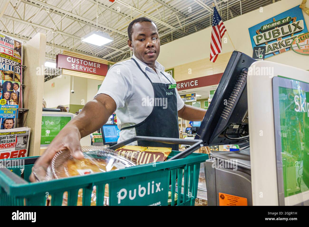 Ft. Fort Lauderdale Florida,Publix supermarket grocery store,cashier checkout Black man male working worker employee Stock Photo