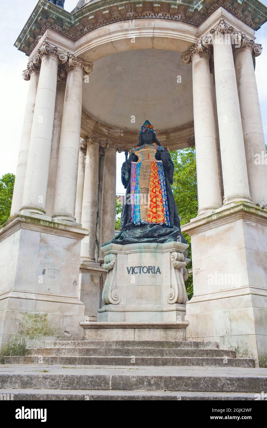 Queen Victoria statue in Liverpool redressed by Karen Arthur and Laurence Westgaph as part of Liverpool's statuesredressed installations in 2021 Stock Photo