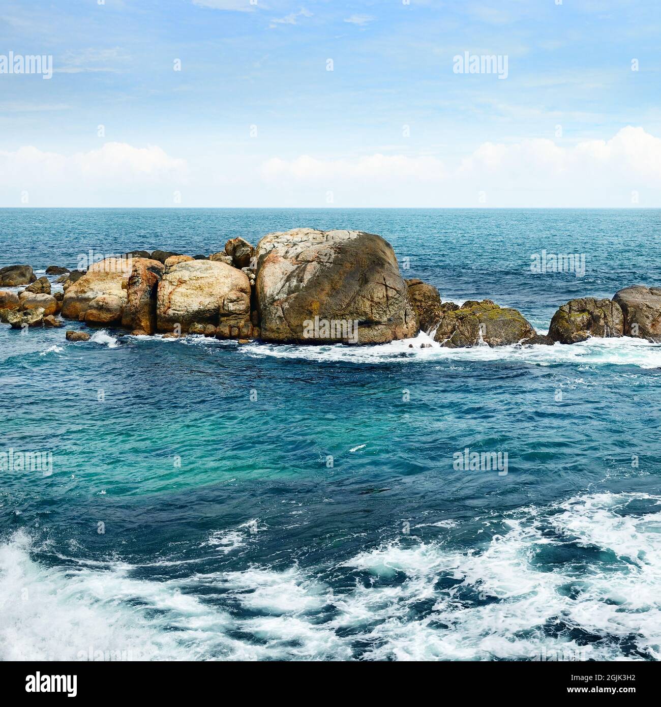 large rock in the ocean Stock Photo