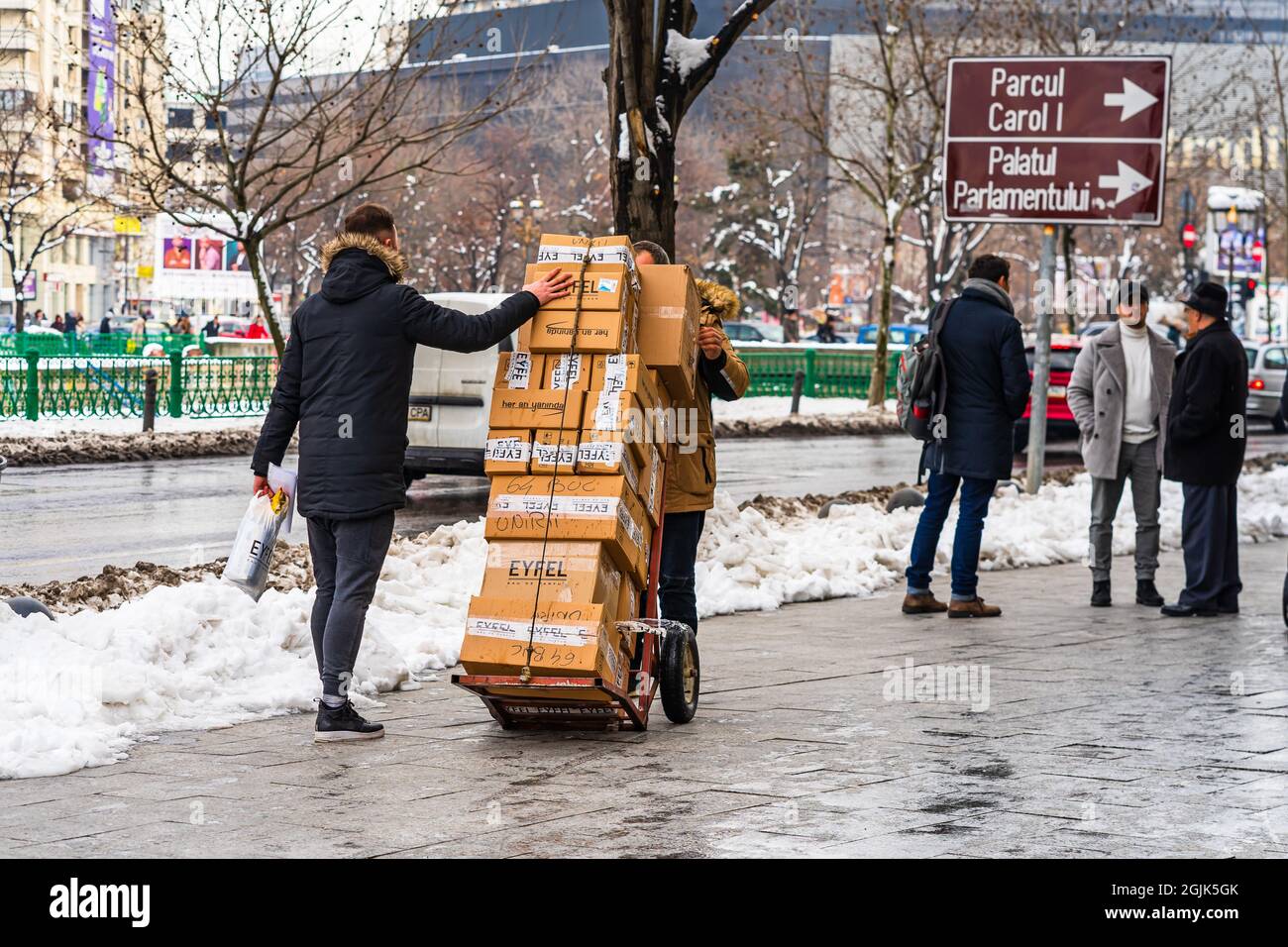People carrying cardboard boxes in Bucharest, Romania, 2021 Stock Photo Alamy