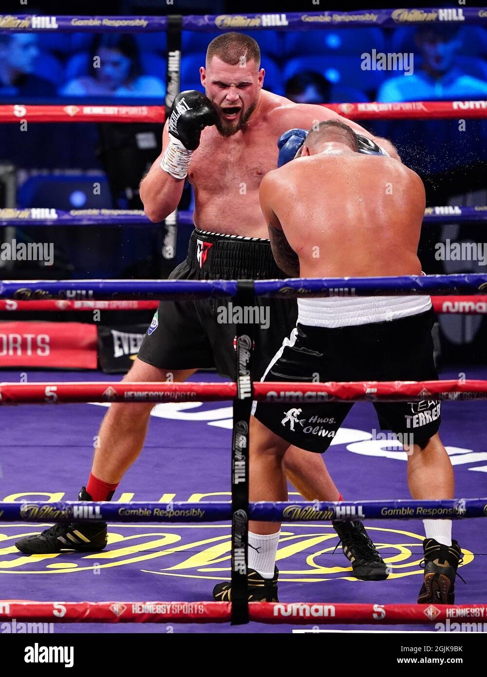 Tommy Welch (left) in action against Alvaro Terrero during the boxing event at the Coventry Skydome Arena. Picture date: Friday September 10, 2021. Stock Photo