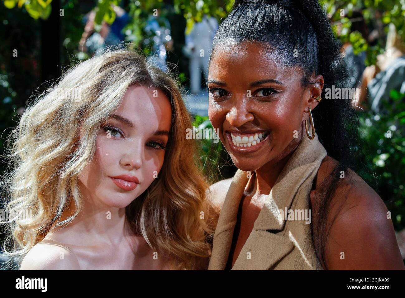 Dove Cameron and Renee Elise Goldsberry at the Michael Kors fashion show at  Tavern on the Green during Spring Summer 2021 Fashion Week in New York, NY  on Sep. 10, 2020. (Photo