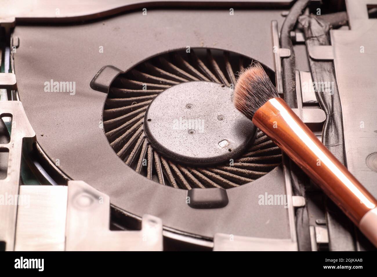 Dusty laptop fan dirty cluttered computer electronics internals Stock