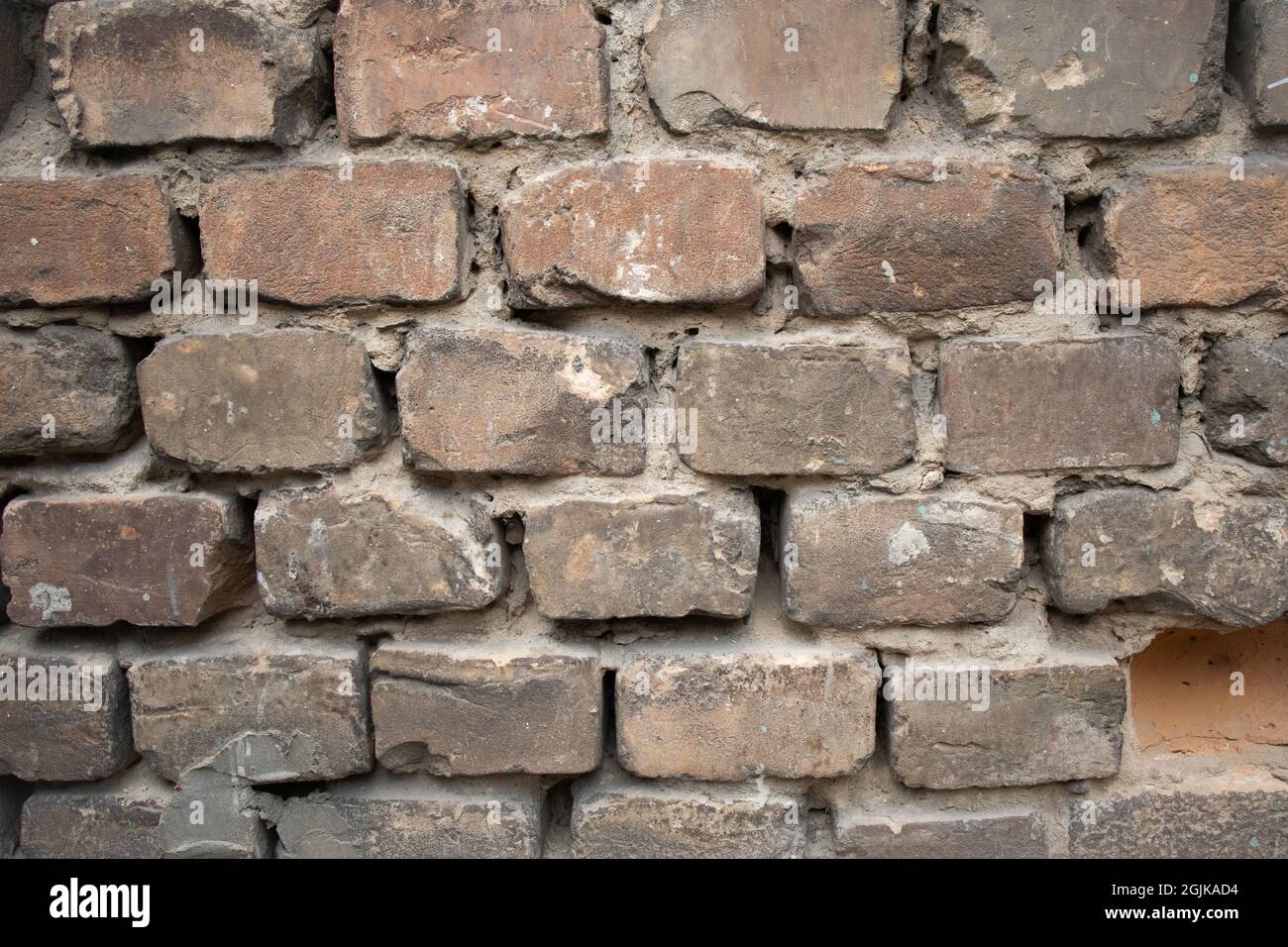 Old brick wall outdoor construction exterior pattern texture Stock Photo