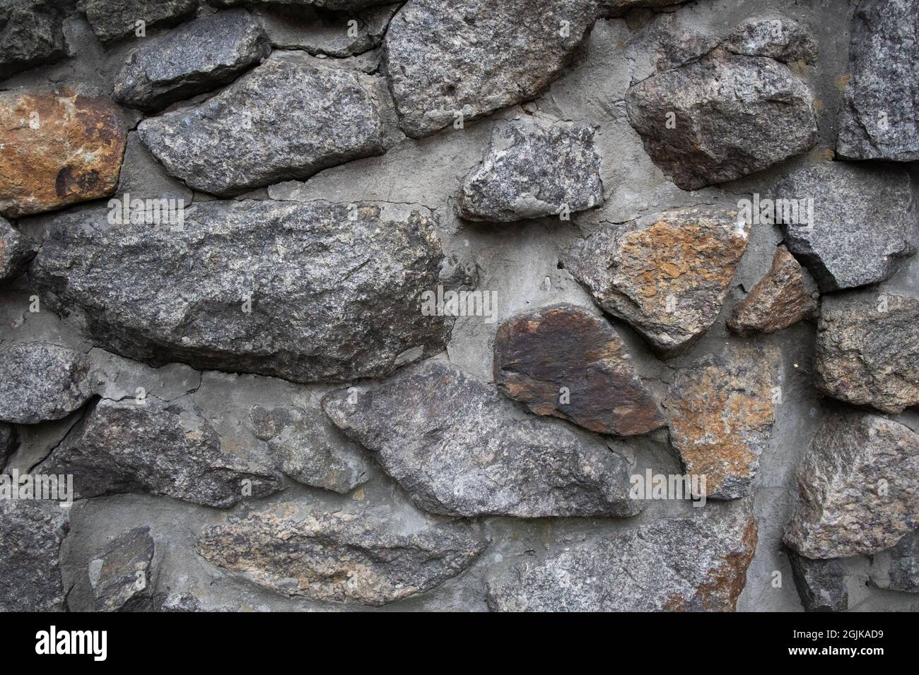 Old stone wall big rocks exterior pattern texture Stock Photo