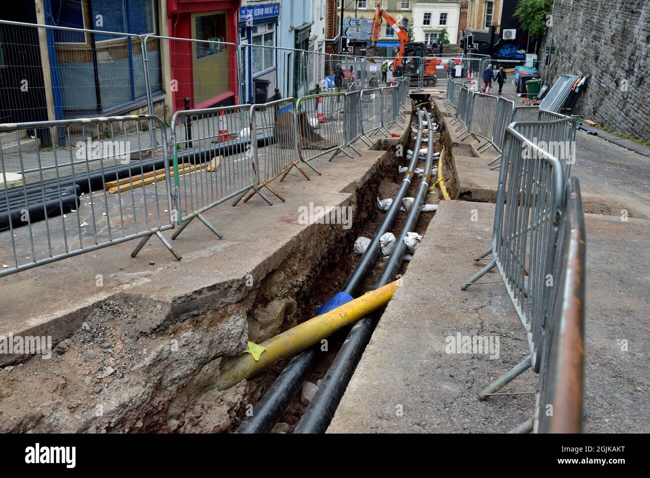 Roadworks to install insulated hot water district heating pipes for hospital site, Bristol, UK Stock Photo