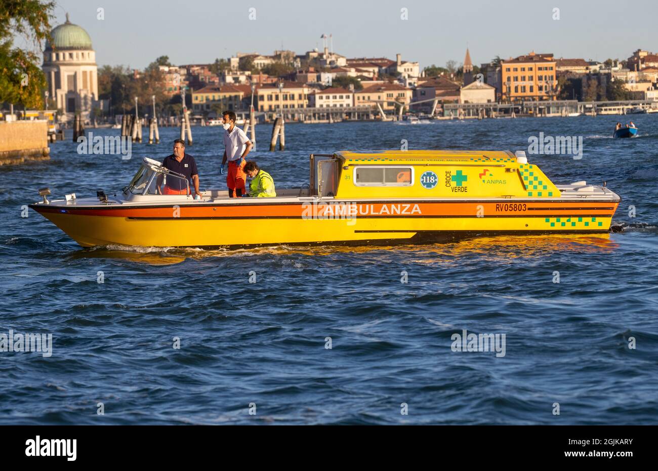 A water ambulance in the lagoon in Venice. Venice's fragile eco-system is protected by Laws that protect Mega Cruise ships from entering the lagoon. Stock Photo