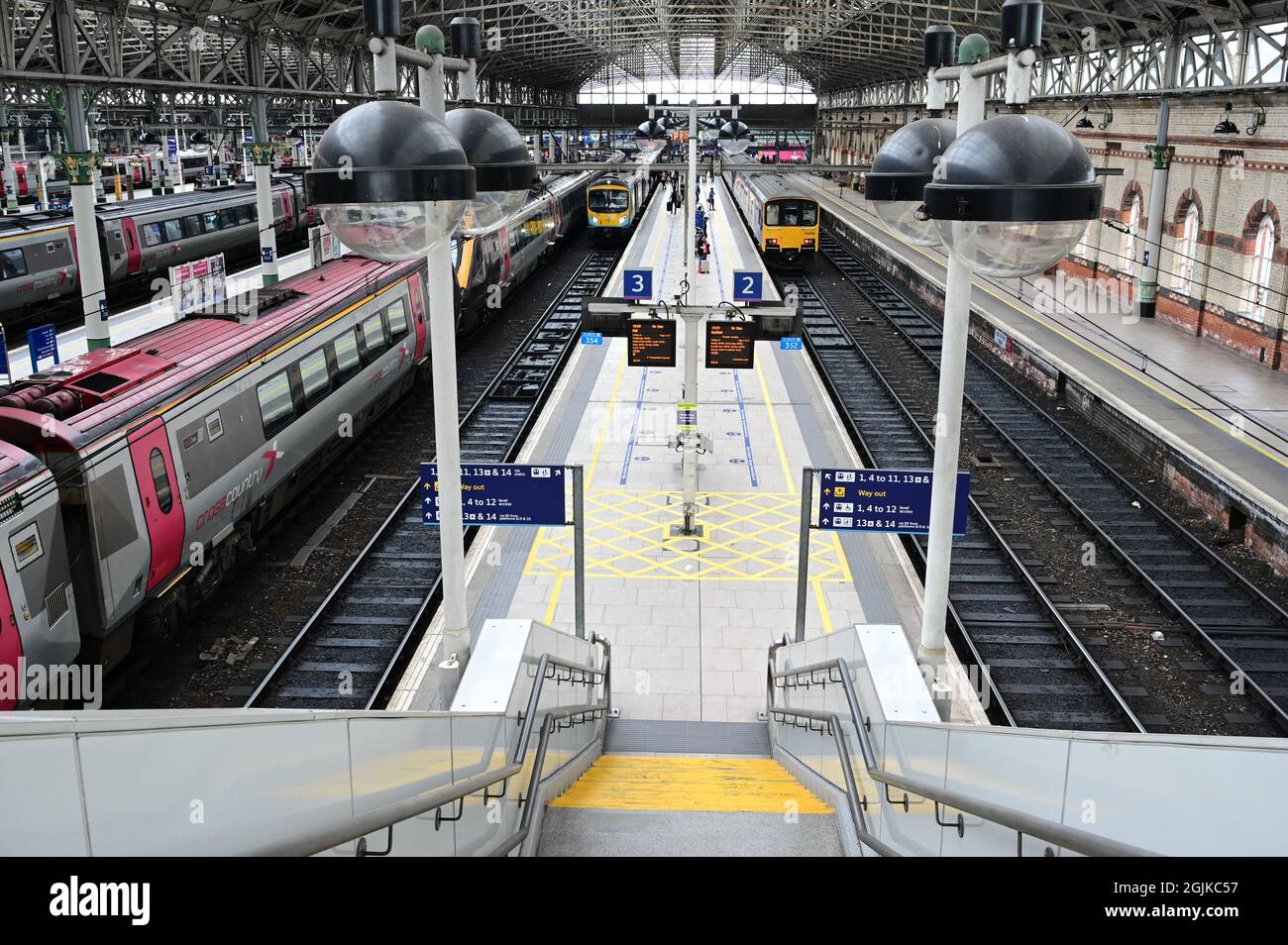 The station platforms inside Manchester Piccadilly station Stock Photo Alamy