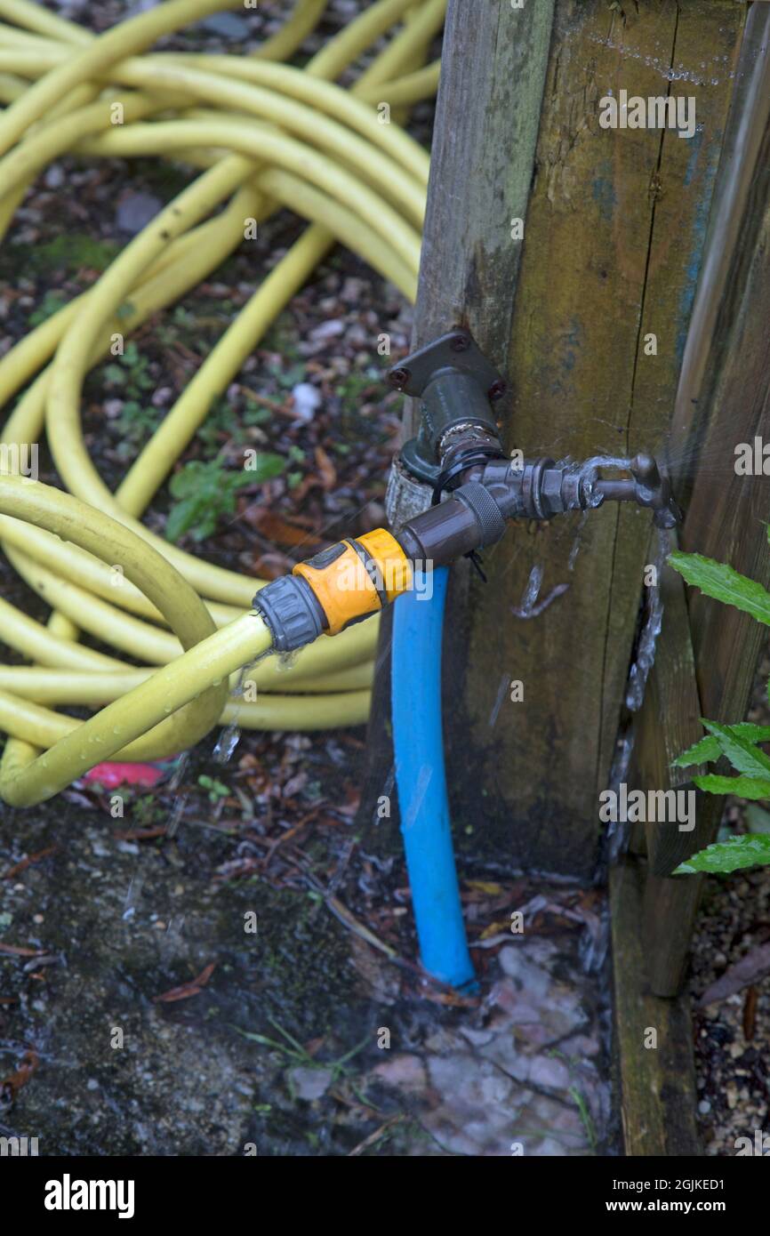 Wadebridge, Cornwall, England, August 30th 2021, A leaking water hose
