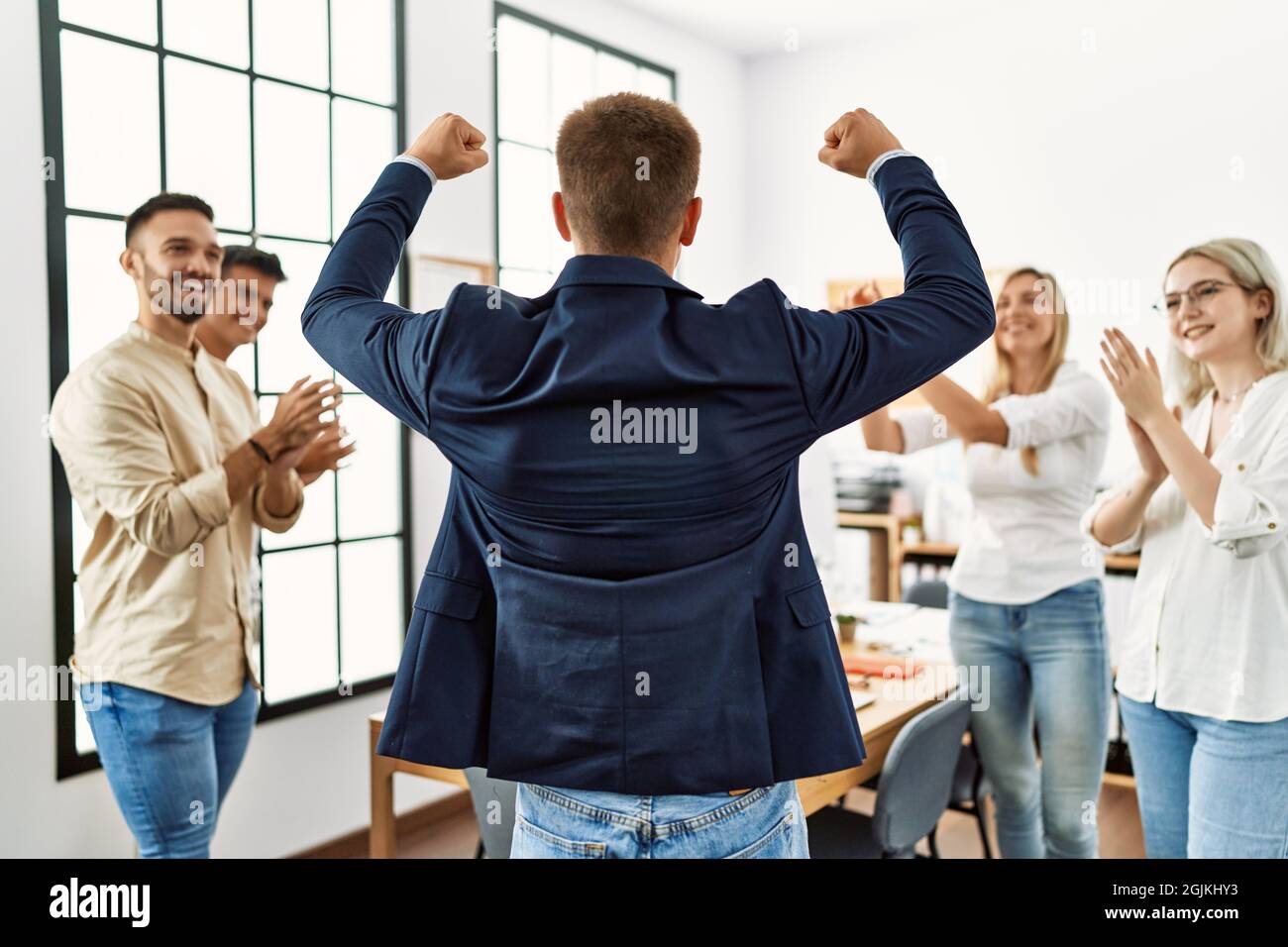 Positive man woman workers clap hi-res stock photography and images - Alamy