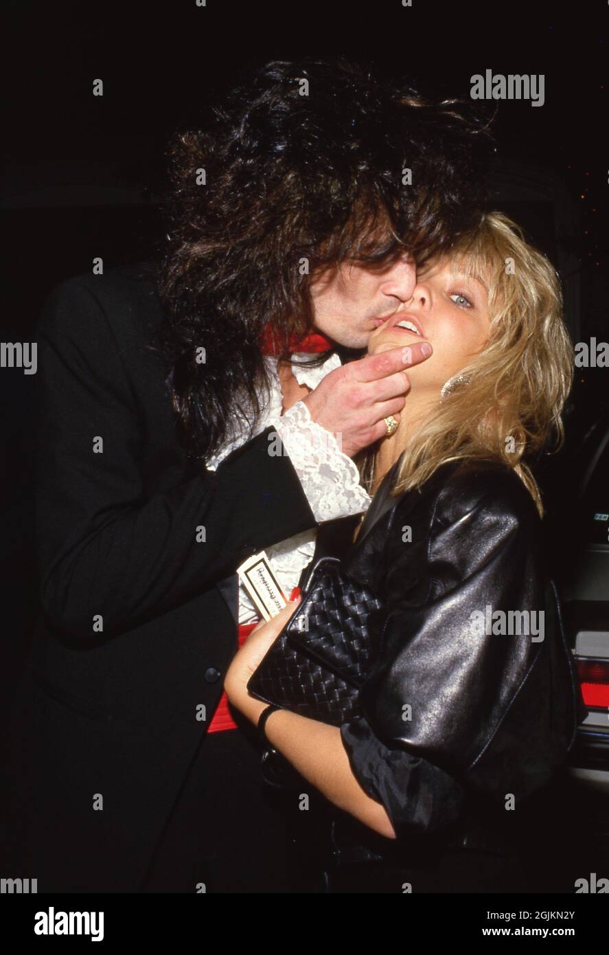 Tommy Lee and Heather Locklear at the Aaron Spelling Party March 11, 1986  Credit: Ralph Dominguez/MediaPunch Stock Photo - Alamy
