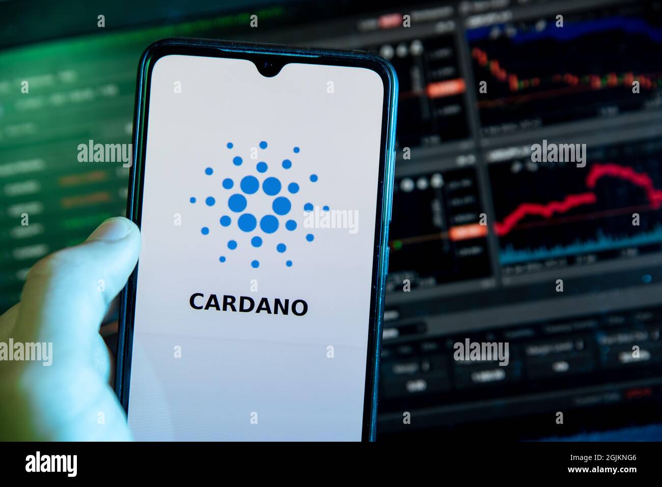 The Cardano cryptocurrency logo is seen on the display of a mobile phone  with a laptop with a stock chart in the background in Barcelona, Spain on  Sep Stock Photo - Alamy