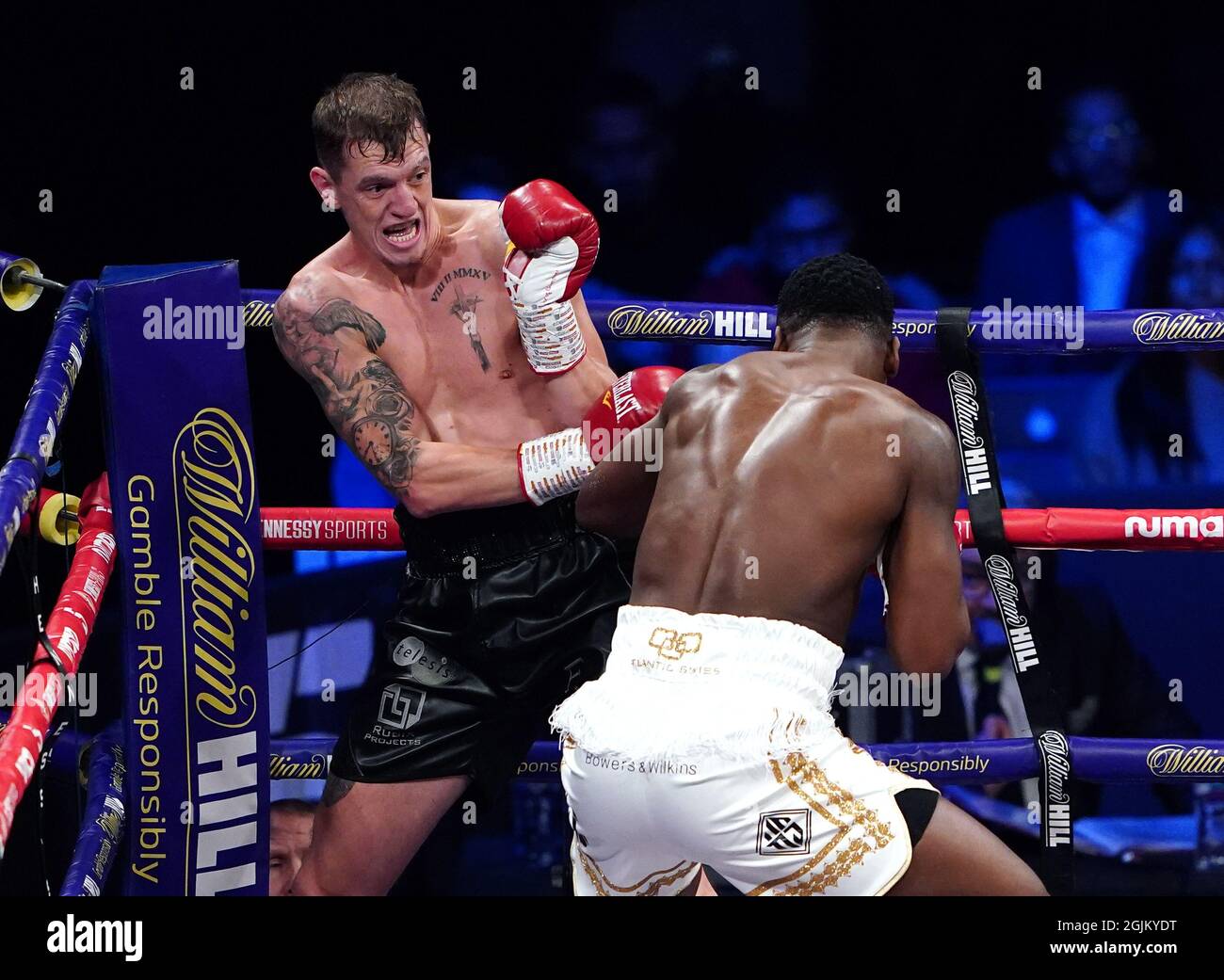 Isaac Chamberlain (right) in action against Ben Thomas during the boxing event at the Coventry Skydome Arena. Picture date: Friday September 10, 2021. Stock Photo
