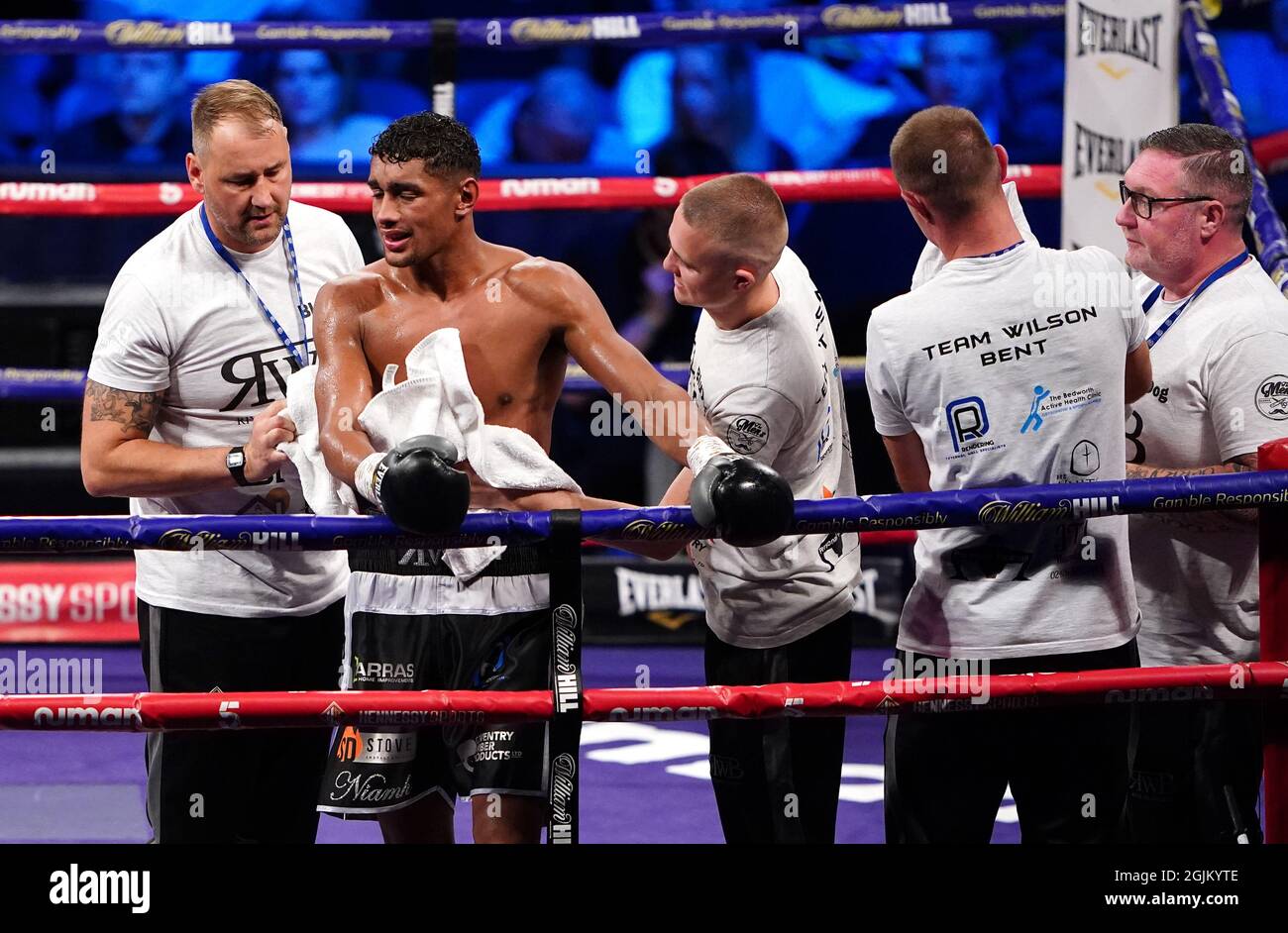 River Wilson-Bent (second left) reacts with his team during the boxing event at the Coventry Skydome Arena. Picture date: Friday September 10, 2021. Stock Photo