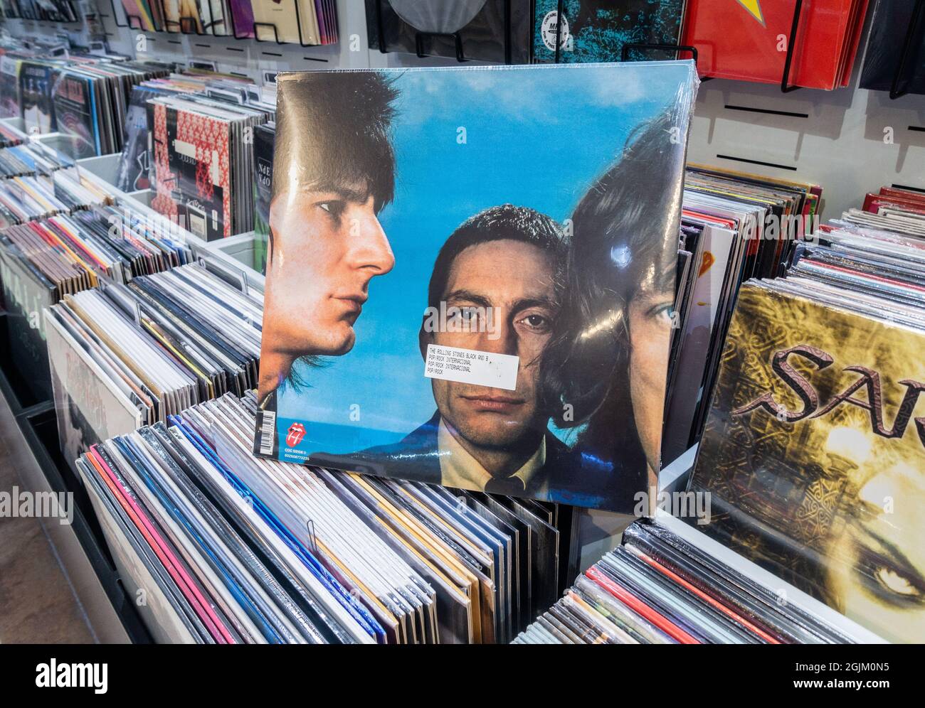 The Rolling Stones Black and Blue vinyl album record with Charlie Watts in  centre Stock Photo - Alamy