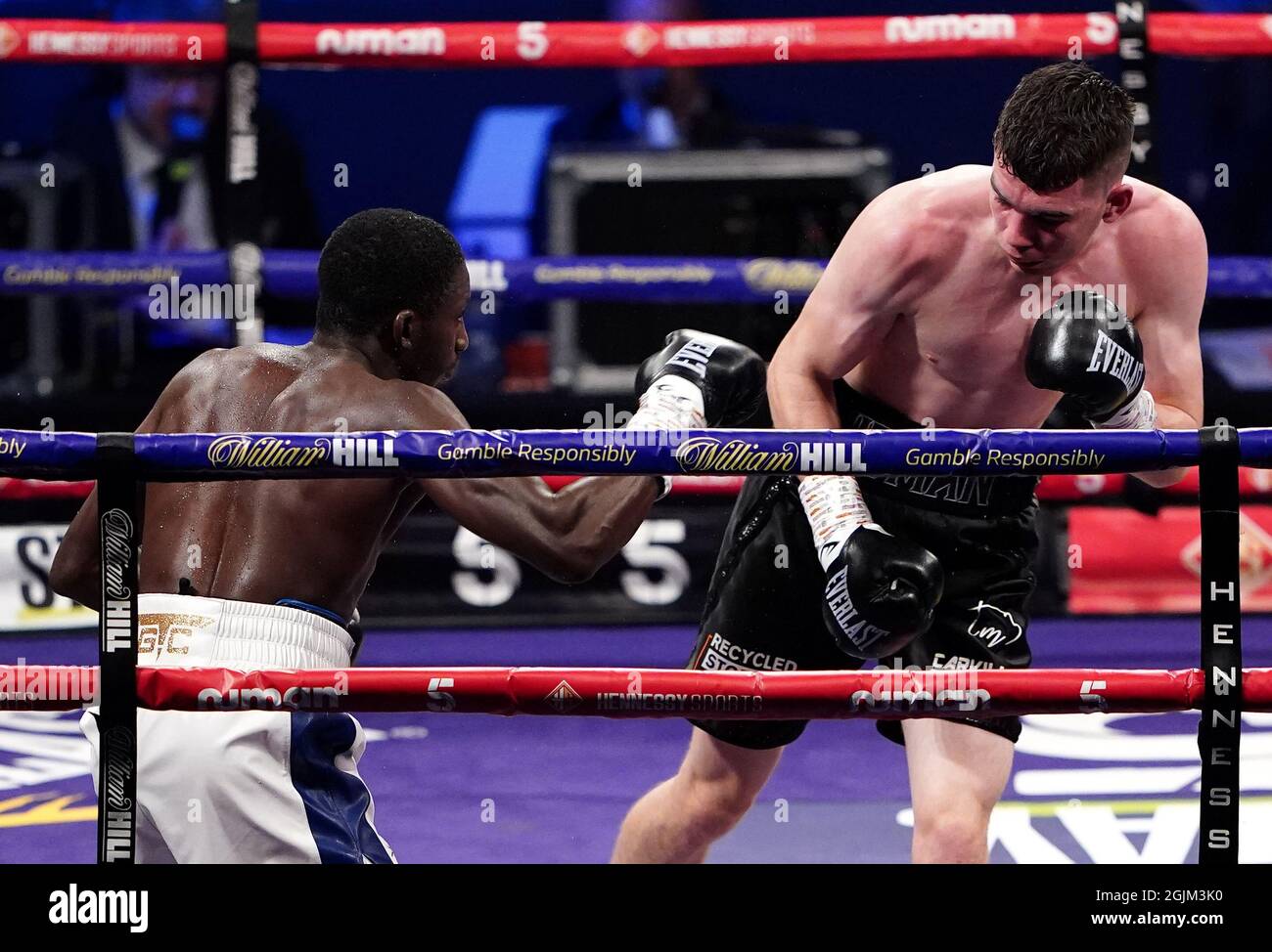 Stephen McKenna (right) in action against Moussa Gary during the boxing event at the Coventry Skydome Arena. Picture date: Friday September 10, 2021. Stock Photo