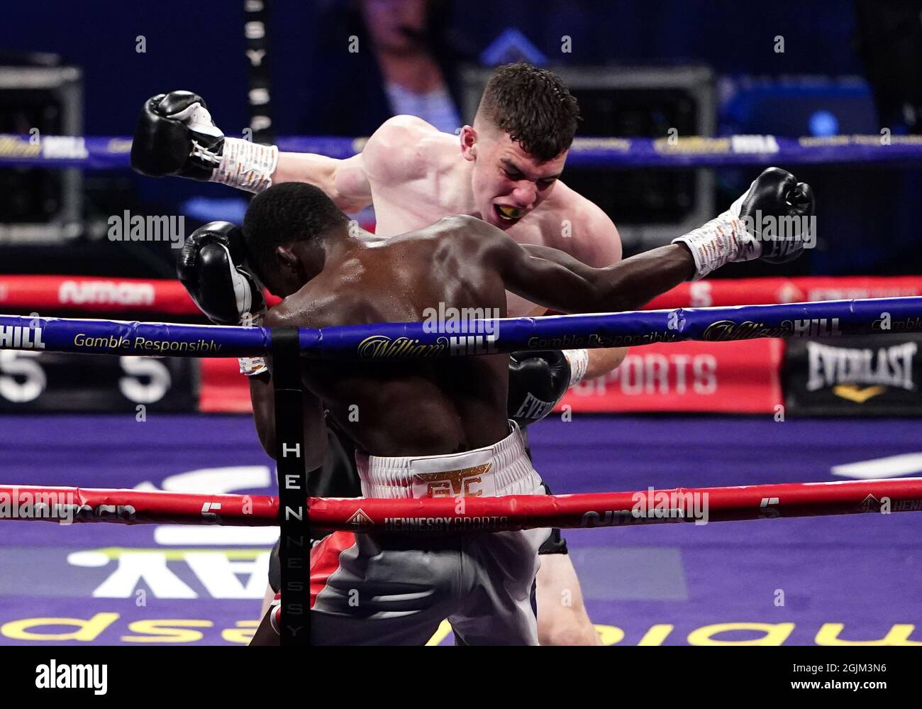 Stephen McKenna (back) in action against Moussa Gary during the boxing event at the Coventry Skydome Arena. Picture date: Friday September 10, 2021. Stock Photo