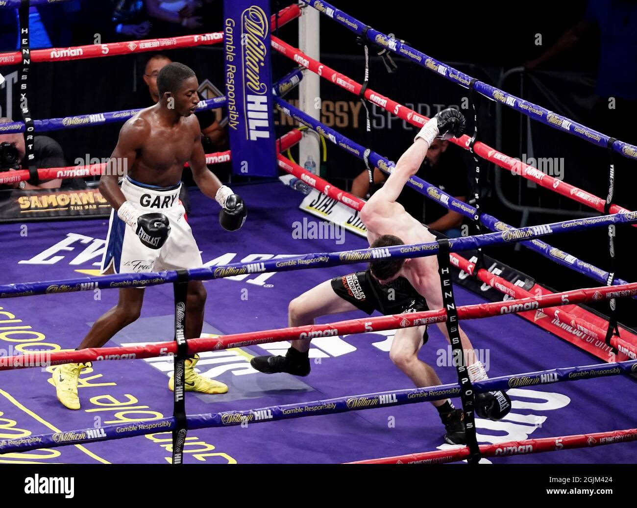 Stephen McKenna (right) in action against Moussa Gary during the boxing event at the Coventry Skydome Arena. Picture date: Friday September 10, 2021. Stock Photo