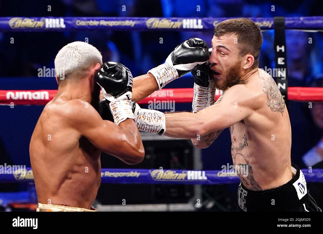 Sam Eggington (right) in action against Bilel Jkitou in the World Boxing Council Silver Middle Title during the boxing event at the Coventry Skydome Arena. Picture date: Friday September 10, 2021. Stock Photo