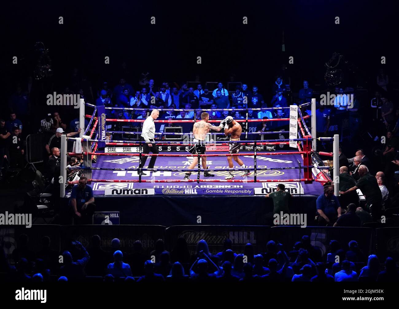 A general view of Sam Eggington (left) in action against Bilel Jkitou in the World Boxing Council Silver Middle Title during the boxing event at the Coventry Skydome Arena. Picture date: Friday September 10, 2021. Stock Photo