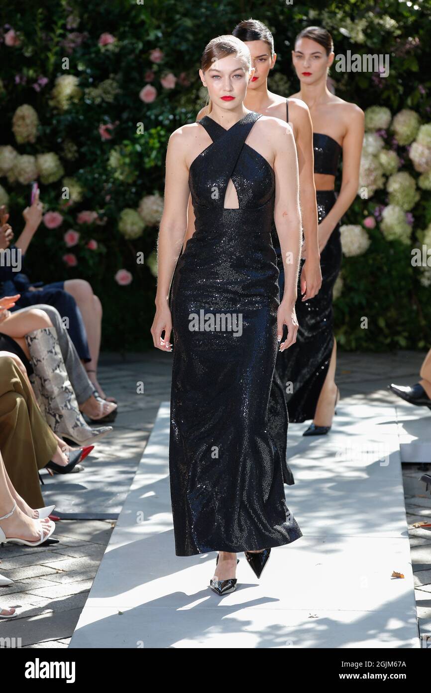 Gigi Hadid walks on the runway at the Michael Kors fashion show during  Spring/Summer 2022 Collections Fashion Show at New York Fashion Week in New  York, NY on Sept. 10, 2021. (Photo