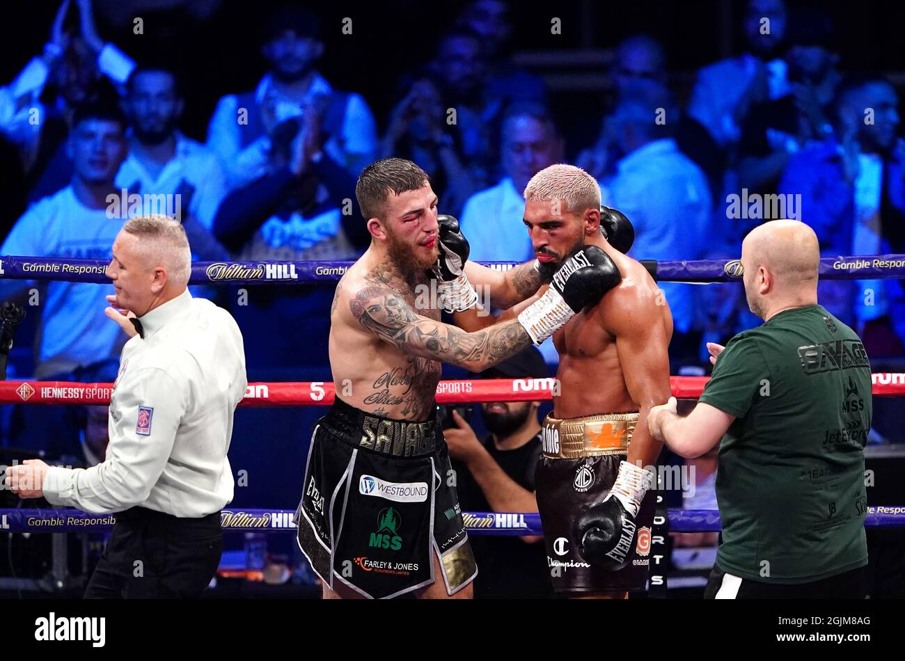 Sam Eggington (centre left) hugs Bilel Jkitou (centre right) after the World Boxing Council Silver Middle Title during the boxing event at the Coventry Skydome Arena. Picture date: Friday September 10, 2021. Stock Photo