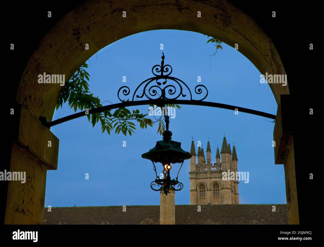 Magdalen Tower phortographed from an archway of New Building, Magdalen College, University of Oxford, Oxford, England, UK Stock Photo