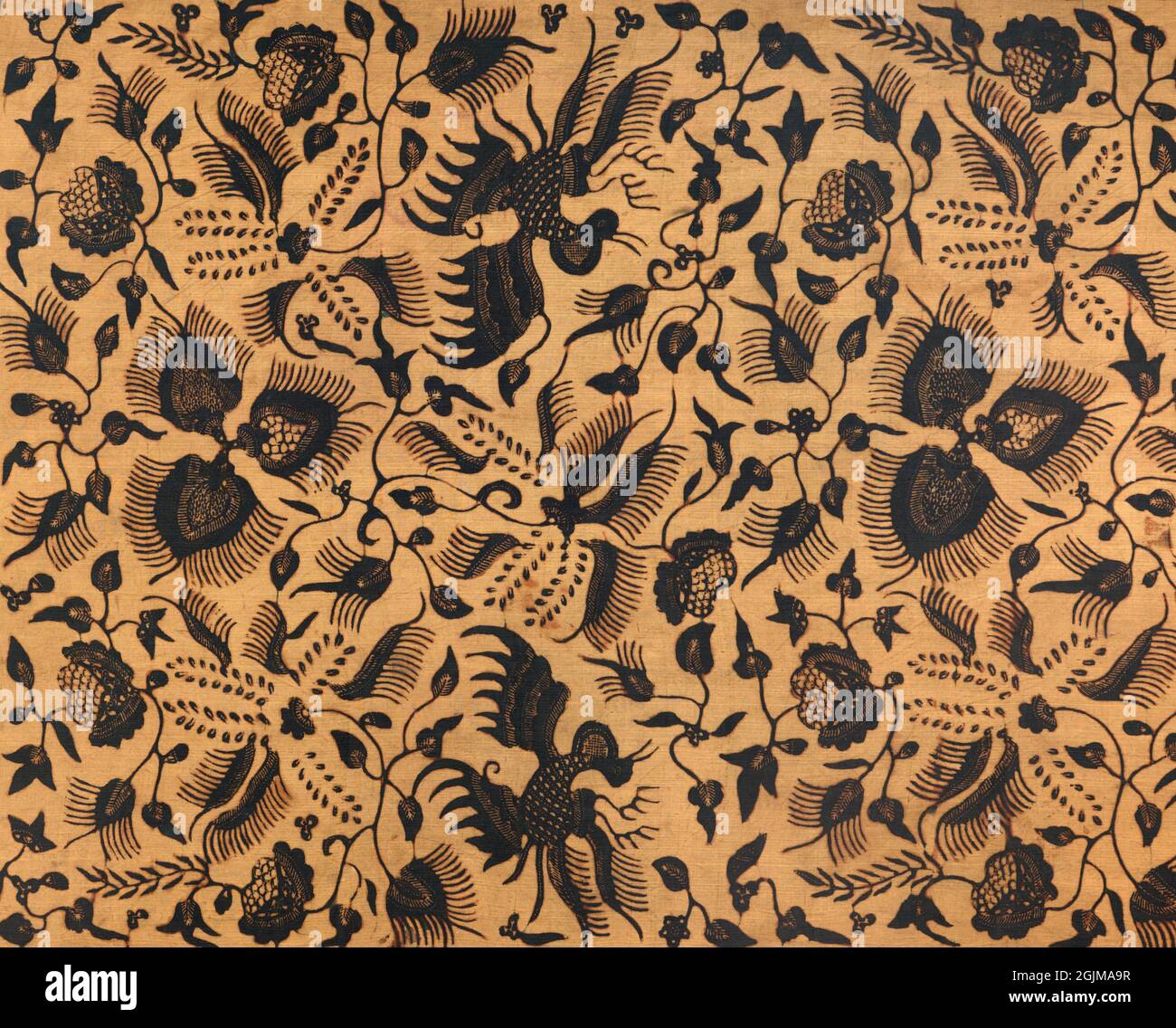 Detail of a Javanese Batik shoulder cloth (selendang) iwith an all-over leaf and flower pattern with birds. Chinese influence indicated by inclusion of the lokcan bird which is based on the phoenix. Java, Indonesia Stock Photo