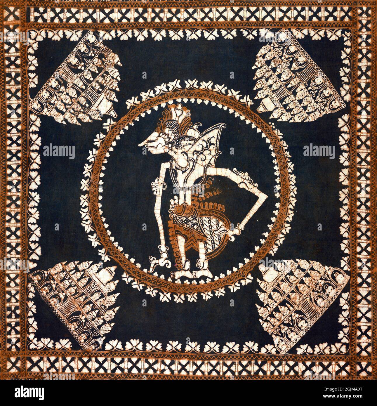 A batik tie-dyed square of cotton fabric depicting a puppet (wayang) figure acting out an  heroic poem of the Mahabharata. Possibly a head cloth (kain kepala).  All four corners ornamented with a stupa motif, not unlike Borobudur. Java, Indonesia; possibly Yogyakarta. Possibly 19th century. Stock Photo