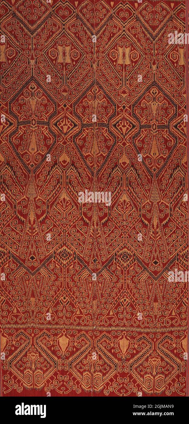 Warp ikat decorated Pua Kumbu, an Iban, Dayak,  ceremonial textile from Borneo. The Iban live in both Sarawak, Malaysia and Kalimantan, Indonesia. Stock Photo