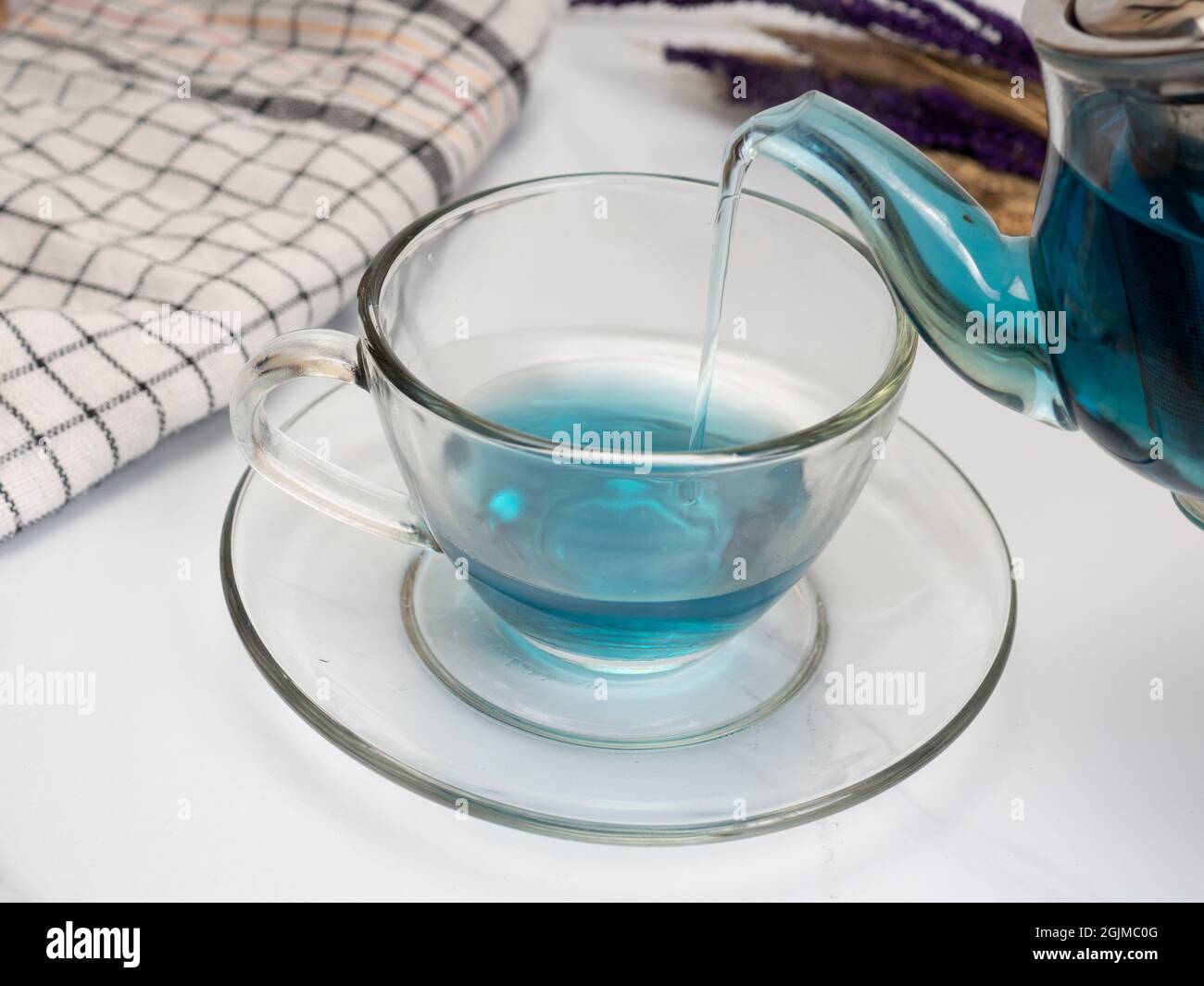 A cup of blue tea that made from buterfly pea flower or Clitoria ...