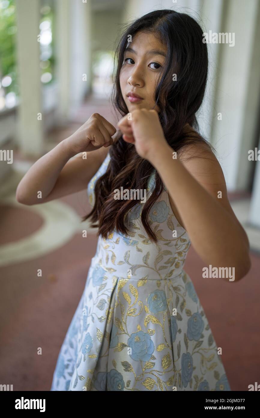 Teenage Asian Girl Doing Martial Arts in Street Clothes Martial Arts