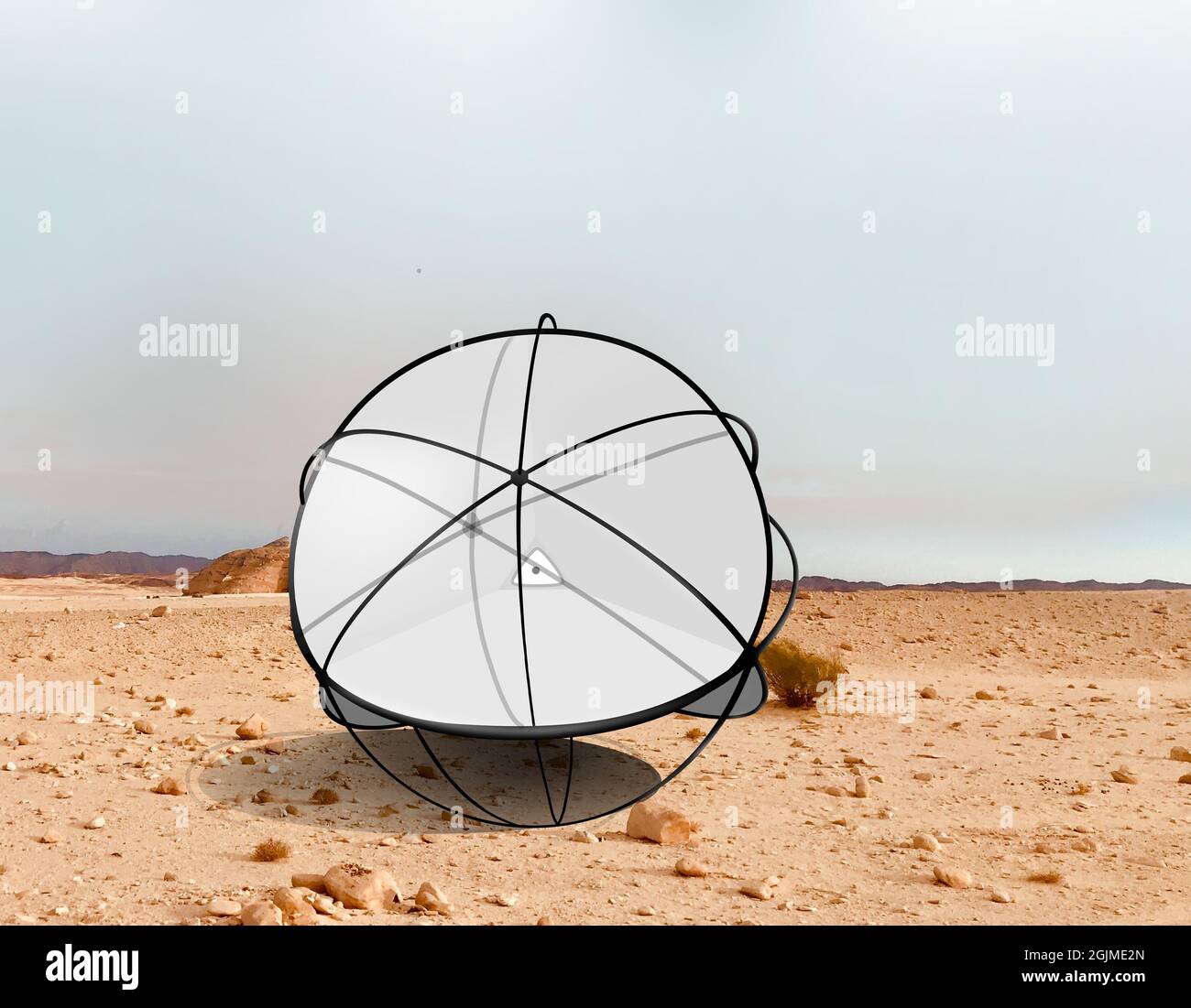Tumbleweed Robot in desert to help prevent desertification.  Ball filled with small sails that easily catch a breeze. Stock Photo