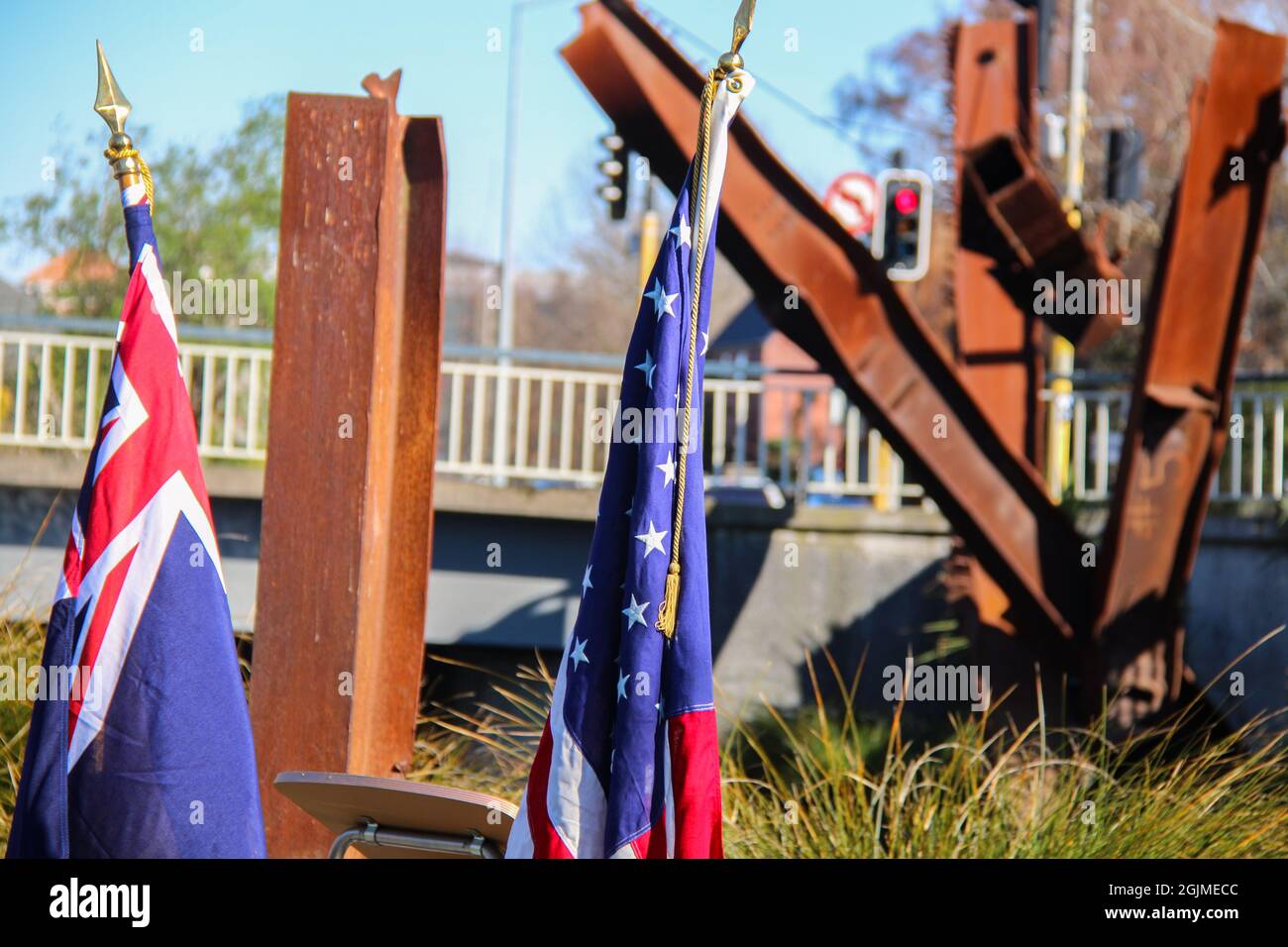 New Zealand and American flags seen next to the wreckage from the World