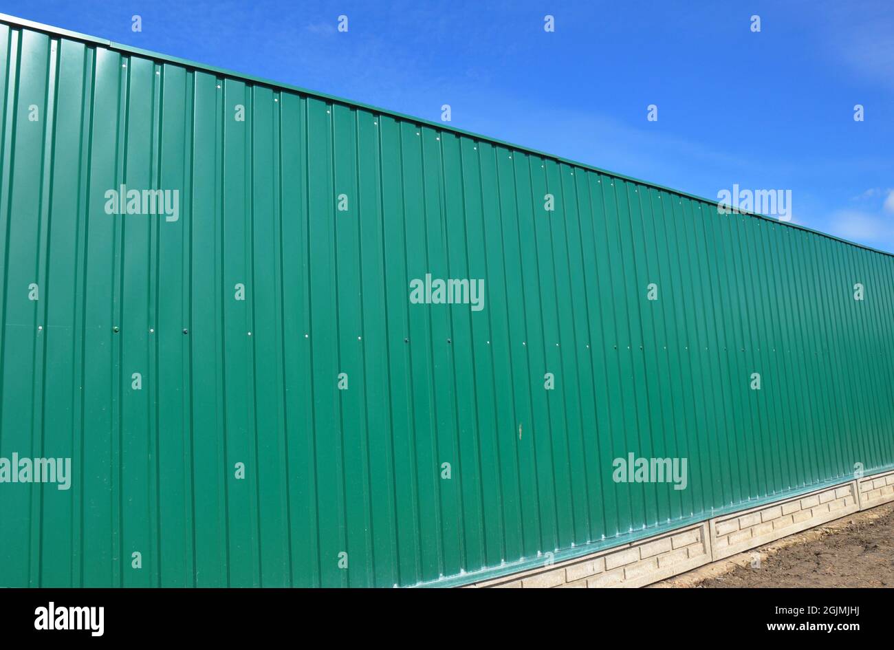 Green Metal Fence Panels and metal fence panel profiles Stock Photo Alamy