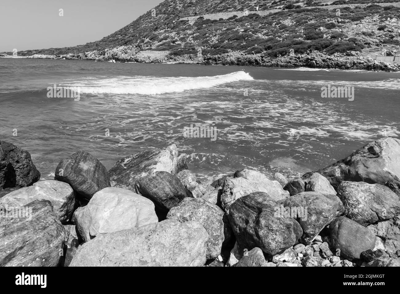 Rocks at a seashore on a hot summer day Stock Photo